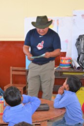Ade reading to schoolkids